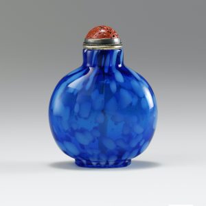 Sapphire-blue glass splashed with white dapples