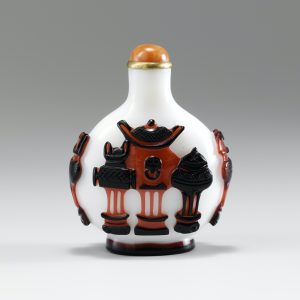 White glass with double overlay of black on red