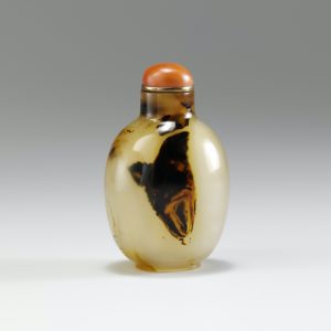Chalcedony with silhouette of bird swooping
