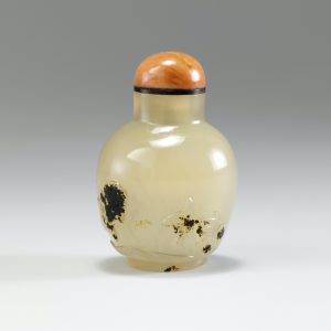 Chalcedony with inclusions carved as fish