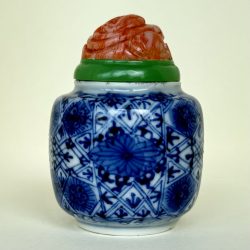 Jar with chrysanthemums